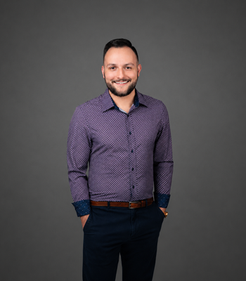 Portrait of J.D. Brickey, Realtor.
